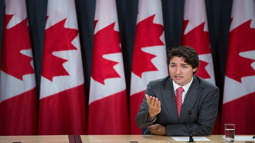 Trudeau condemns misinformation about UN migration pact